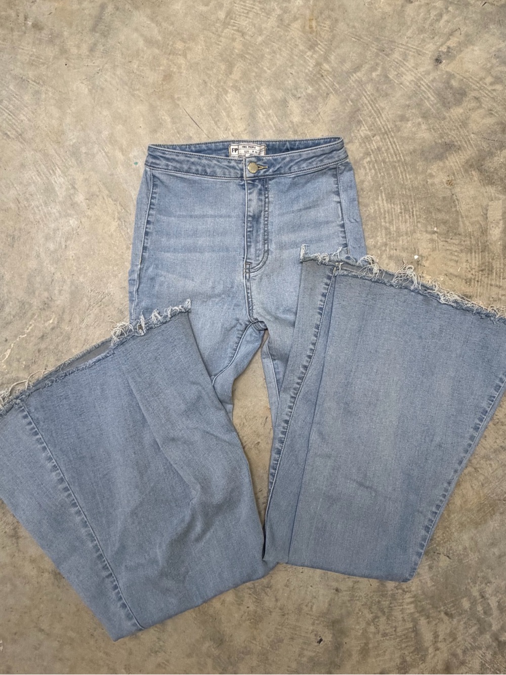 We The Free Light Blue High-Rise Wide-Leg Jeans with Frayed Hem